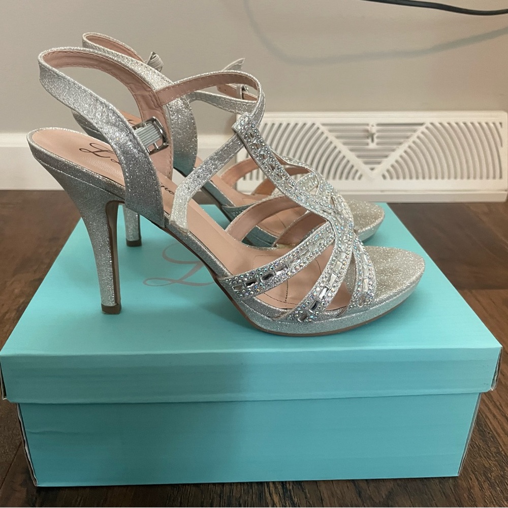 Size 7.5 silver heels with gems